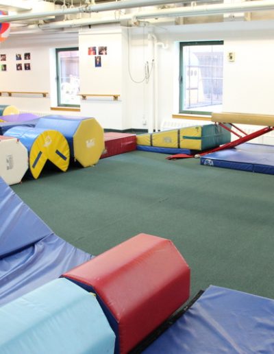 A Columbus gym in New York that offers gymnastics for kids, with a variety of equipment tailored for toddlers.