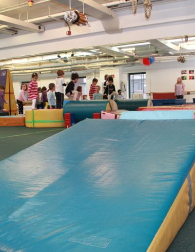 Columbus Gym in New York offers a children's play area equipped with a variety of equipment for kid parties and gymnastics for children.